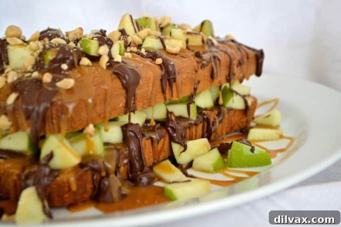 A Sara Lee pound cake, chopped Granny Smith apple, salted caramel, melted chocolate and peanuts make this an easy and delicious dessert.