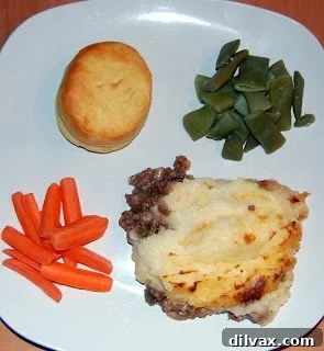 Baked Shepherd's Pie with golden brown mashed potato topping.