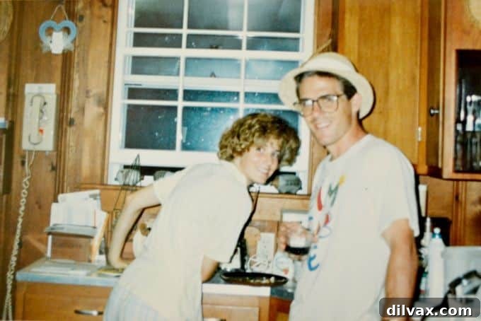 Newlyweds preparing food in mother's GE kitchen before moving to Chicago