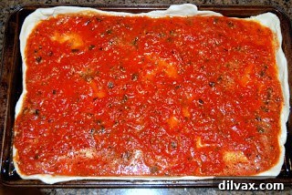 Margherita Pizza Day 36 5 Margherita pizza with sauce and cheese before baking