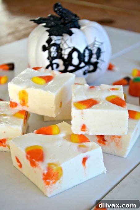 Close-up of creamy white chocolate candy corn fudge, perfect for Fall.