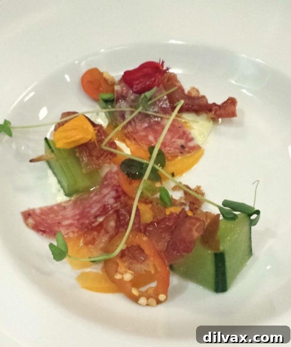 Crafting Porks Future A National Board Expedition 4 Exquisite Local Heirloom Tomato & Charcuterie Salad with pork elements.