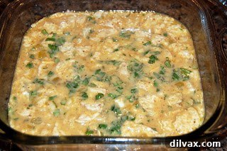 Day 21 Chile Cheese Casserole Delight 5 The Chile Cheese Casserole mixture just poured into a rectangular baking pan, ready for the oven.