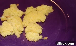 Day 16: Golden Corn Crisps 5 Baked corn crisps on a cookie sheet, just out of the oven