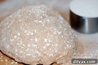Day 10: My Best Whole-Wheat Oatmeal Bread Yet 2 Freshly mixed bread dough on a floured surface, ready for kneading.