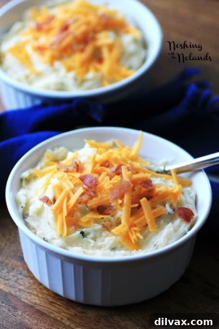 Fluffy mashed potatoes loaded with cheese, bacon bits, and savory toppings, mimicking the popular restaurant classic.