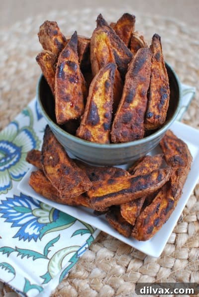 Sweet and spicy potato wedges, baked to crispy perfection.