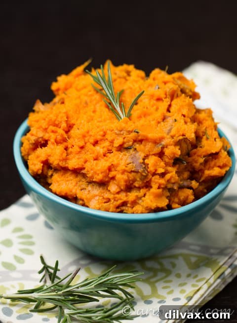 Creamy mashed sweet potatoes infused with fragrant rosemary, rich olive oil, and delicate sea salt.