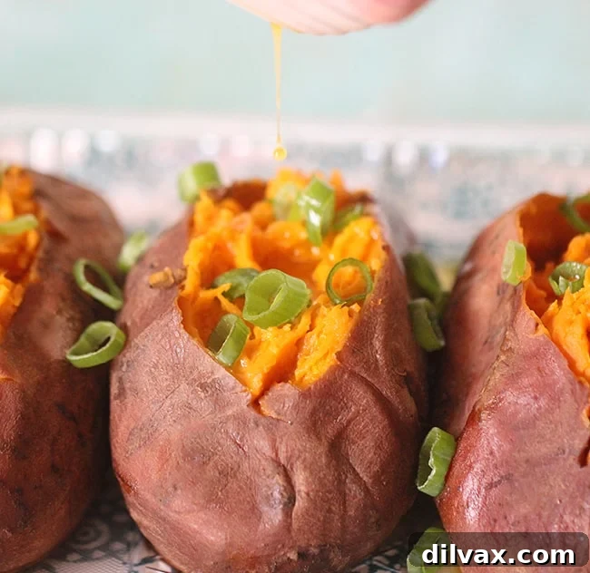 Tender sweet potatoes cooked effortlessly in a slow cooker, a convenient side for busy holiday weeks.