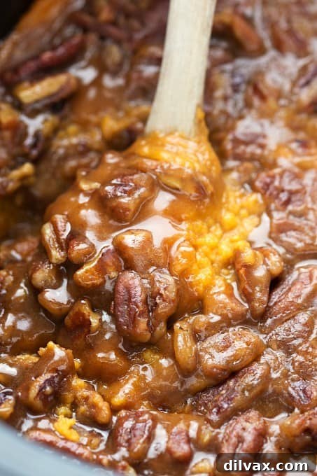 Easy and make-ahead friendly sweet potato casserole, prepared in a crockpot to save oven space during holidays.