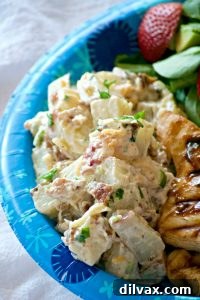 Our Loaded Red Bliss Potato Salad is packed with all the delicious fixings: a creamy Dijon-mayo dressing, crispy bacon, fresh green onions, and savory cheese. This is a potato salad you'll want to enjoy all summer long, and beyond!
