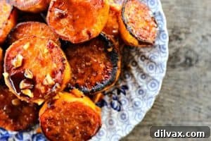 Thick sweet potato wedges roasted until incredibly tender and meltingly soft, seasoned with garlic.