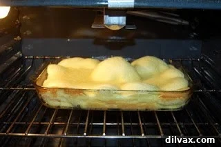 Day Seven: The Grand Experiment Unfolds 3 Second image of the failed baked blintz experiment, showing a closer view of the heavy, collapsed texture.