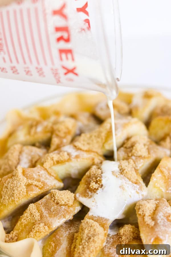 Effortless Apple Cream Dream 3 Pouring cream over some cinnamon sugar apples.