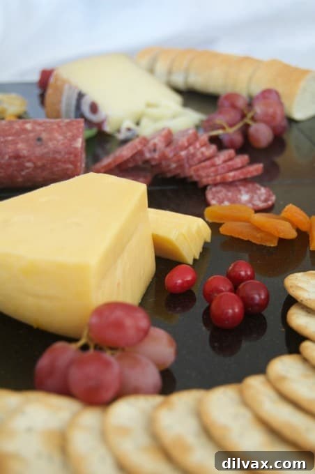 Creating a colorful, appealing and tasty cheese board for entertaining is easy with these ingredients!