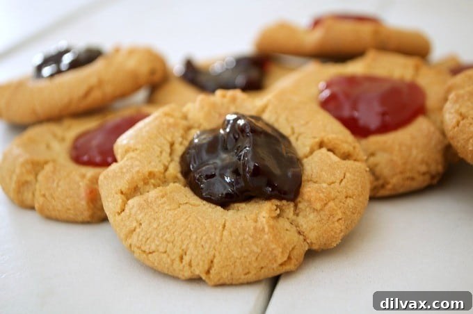 A simple peanut butter cookie indented in the middle and filled with strawberry preserves. It's a peanut butter and jelly sandwich in cookie form.