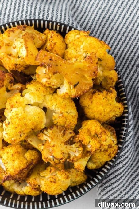 Roasted cauliflower with curry and cajun seasoning.