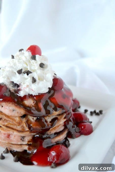Buttermilk Pancakes with chocolate chips and diced Maraschino cherries - a delectable breakfast treat!