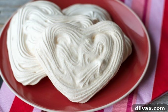 Heart Meringues with Berries and Cream - only three ingredients to make these pretty meringues.
