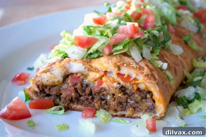 Kickin' Buffalo Chicken Meatballs 8 Taco Braid - a fun and easy way to eat a taco with a flaky crust and savory filling!