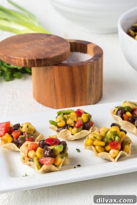 Green Gold Salsa 9 Delicious salsa with avocado, corn, red pepper, and black beans, ready to eat.