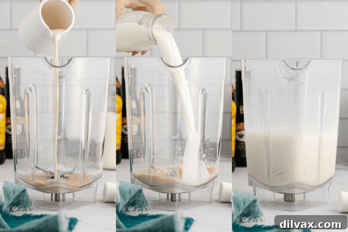 Second step of making a Frozen Marshmallow Mudslide: blended ingredients in a pitcher, ready to be poured.
