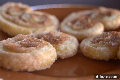 Cinnamon Sugar Palmiers on a plate, ready to be enjoyed