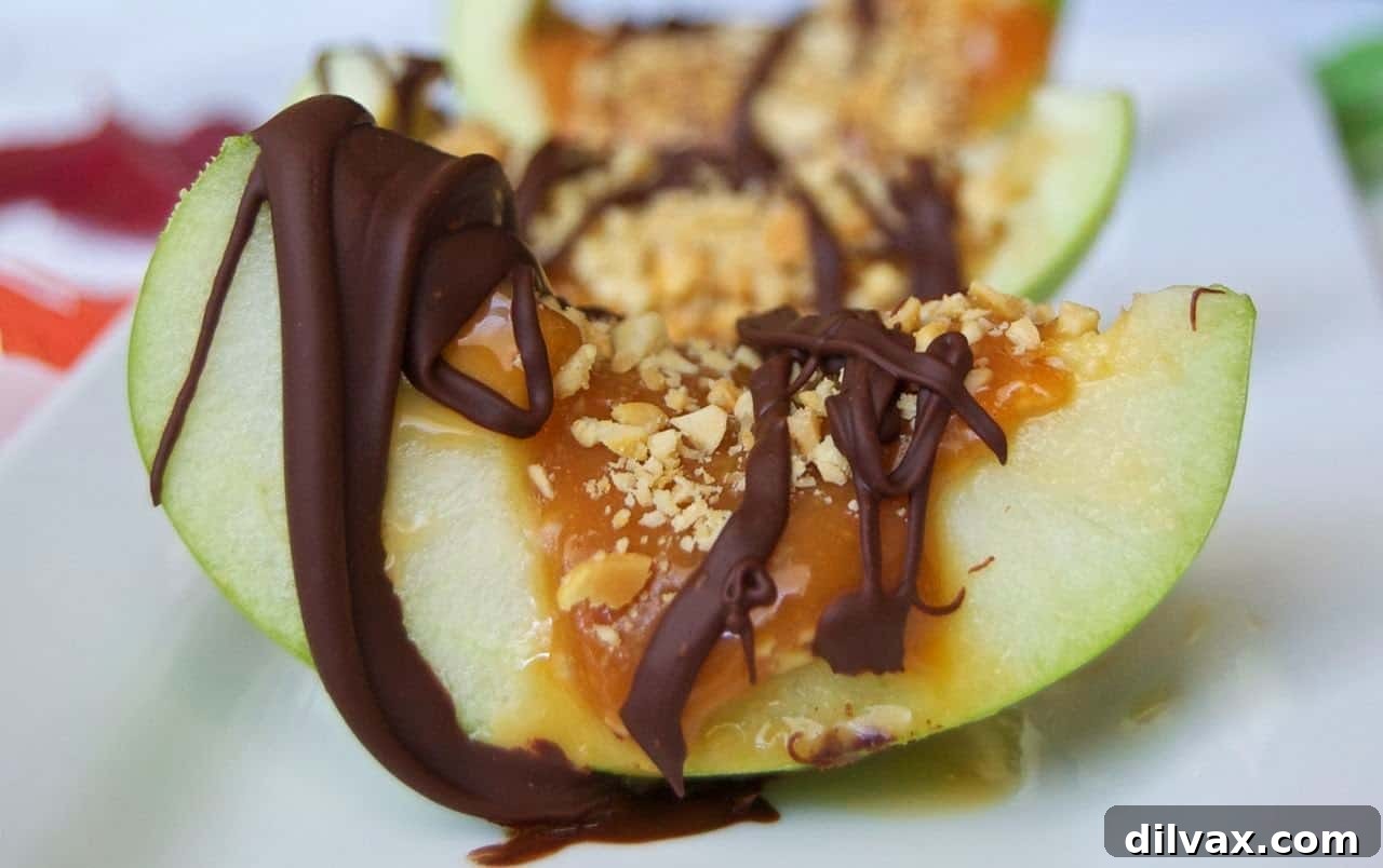 Inside Out Caramel Apples in small cups with apple slices and caramel sauce