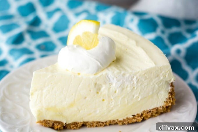 Vibrant No-Bake Lemon Cheesecake, perfectly garnished with fresh lemon slices, suitable for spring gatherings and summer barbecues