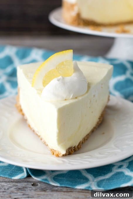 Close-up of a generous slice of creamy lemon cheesecake, highlighting its smooth texture and refreshing appeal, ideal for any spring or summer occasion