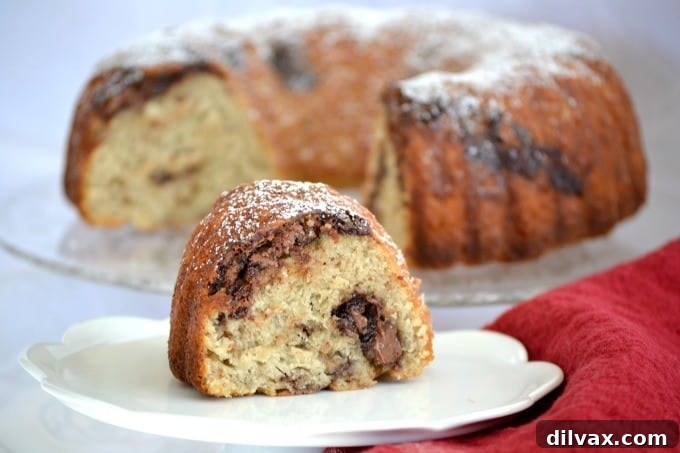 Golden Banana Bundt with Nutella Ribbons 2 This Nutella Swirl Banana Bundt Bread is Nutella mixed in to a banana bread batter and shaped into a beautiful bundt cake - perfect with a cup of coffee!