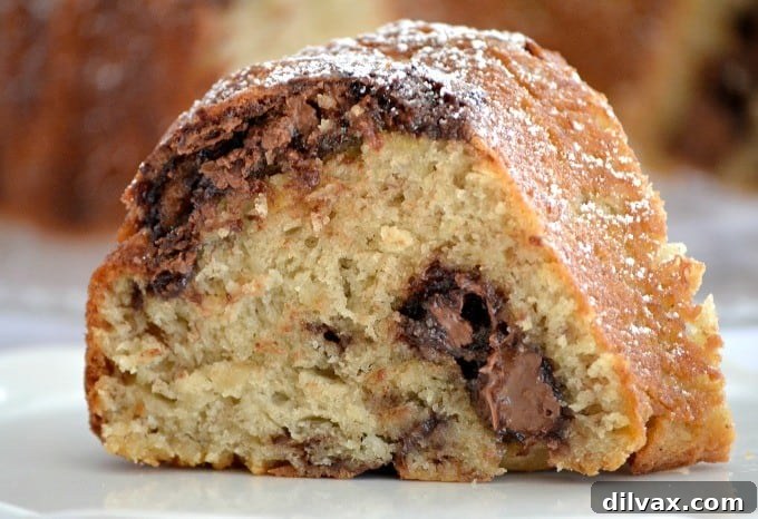 Golden Banana Bundt with Nutella Ribbons 7 This Nutella Swirl Banana Bundt Bread is Nutella mixed in to a banana bread batter and shaped into a beautiful bundt cake - perfect with a cup of coffee!