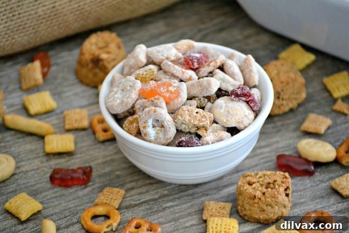 A beautifully presented bowl of Cookie Butter Snack Mix, artfully arranged with various components, ready for sharing or enjoying.