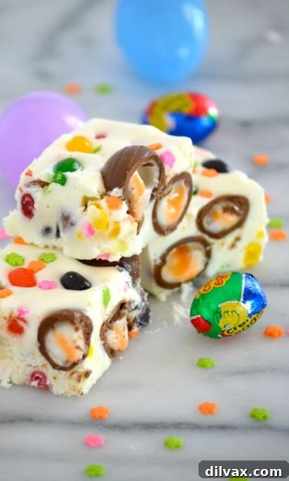Colorful Easter Fudge 12 Another perspective of the Easter Fudge, featuring a perfectly cut piece to highlight the creamy texture and colorful candy inclusions.