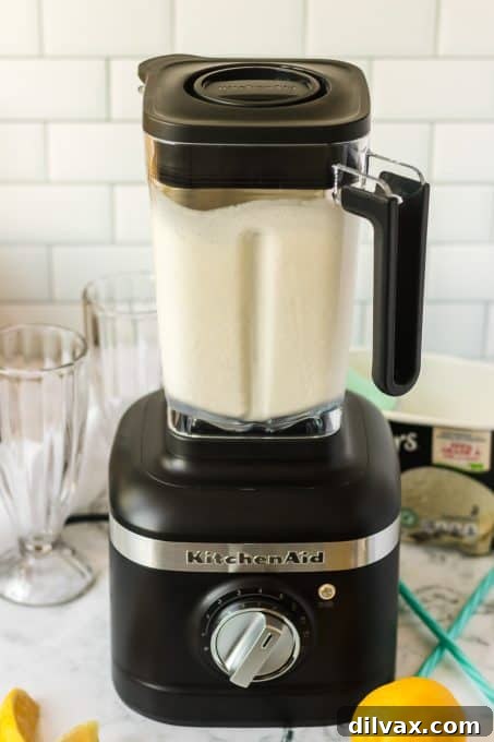 Perfect Frosted Lemonade Dupe: 3 Ingredients, Zero Added Sugar 7 A blender full of a thick, creamy lemonade milkshake, ready to be served.