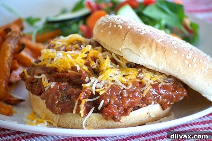 The perfect sloppy joe made in a slow cooker, served on a bun