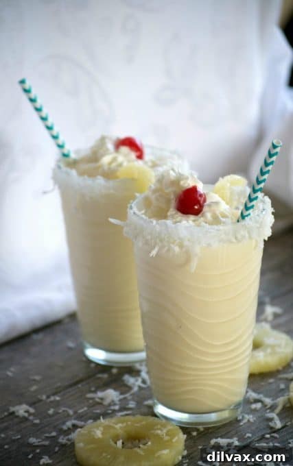 A refreshing Pina Colada Milkshake, a taste of the tropics in every sip.