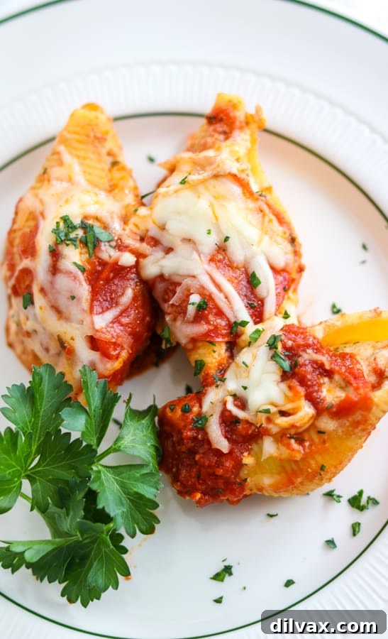 A baking dish filled with Pepperoni Pizza Stuffed Shells, ready for baking or freezing, ideal for future meals.