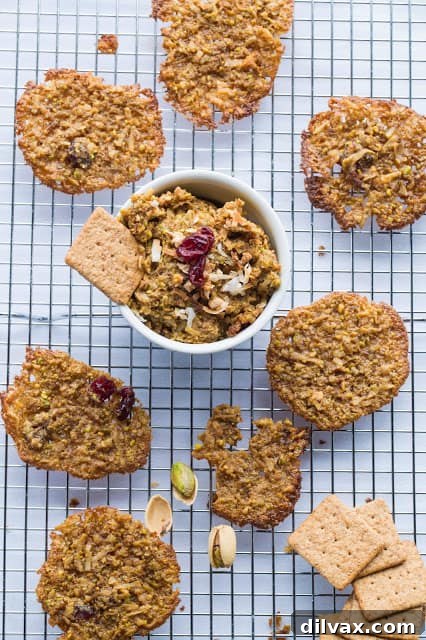 Pistachio Coconut Frosting served as a festive dip or frosting 'cheese ball' with crackers and apple slices