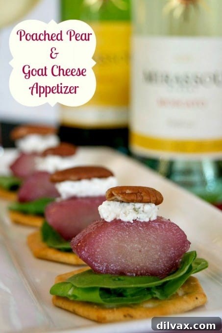 Elegant Merlot poached pears paired with arugula and goat cheese, a flavorful holiday appetizer.