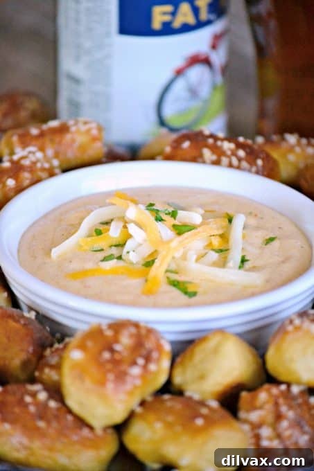 Close-up shot of a plate filled with golden homemade pretzel bites, perfect for dipping.