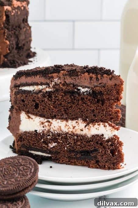 Decadent Oreo Dream Cake 3 A stunning top-down view of the whole Oreo Cake, showcasing its rich chocolate frosting and cookie crumb topping.