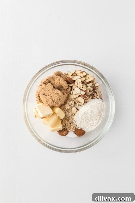 Golden Skillet Blueberry Crisp 6 Almond Oatmeal topping ingredients mixed together for a blueberry crisp.