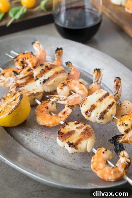Succulent Grilled Shrimp and Scallop Kabobs with colorful vegetables.
