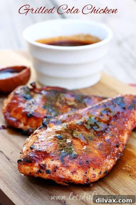 Sticky Grilled Cola Chicken with a rich, dark glaze.