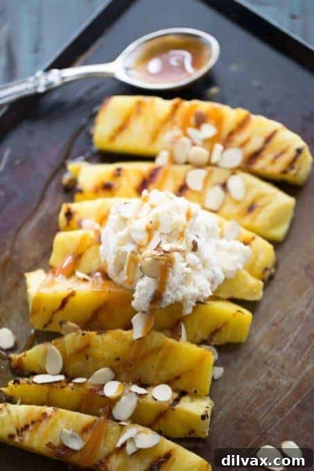 Sweet and caramelized grilled pineapple slices.