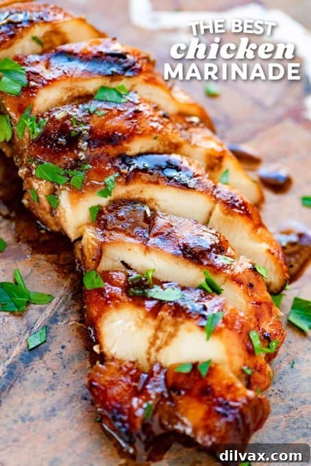 Chicken breasts marinating, ready for the grill with 'Best Chicken Marinade'.