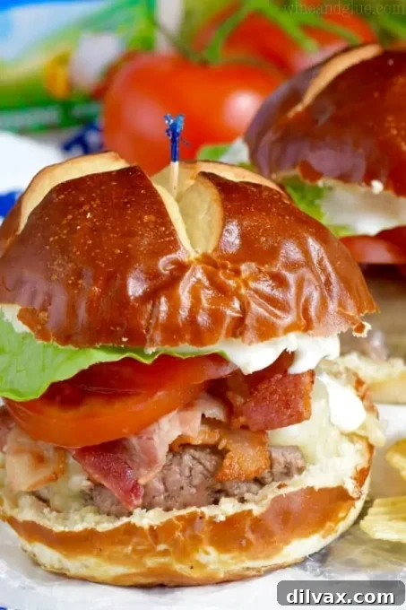 Hearty BLT Ranch Burgers, topped with bacon, lettuce, tomato, and a creamy ranch sauce.