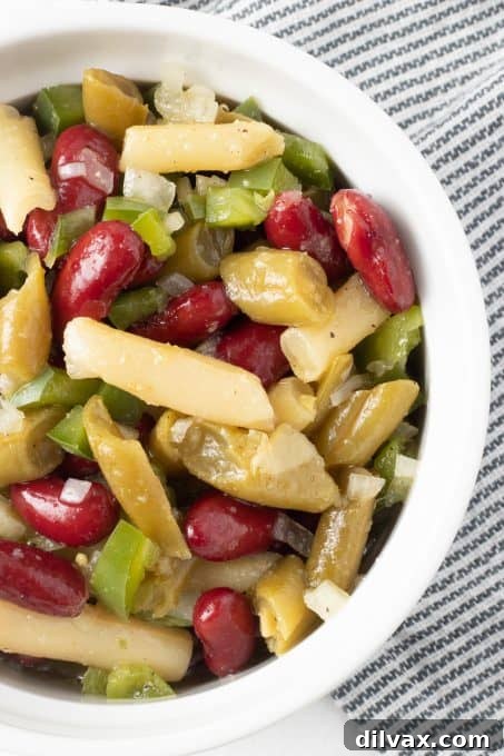 A close-up shot of the three bean salad, highlighting the texture and dressing.