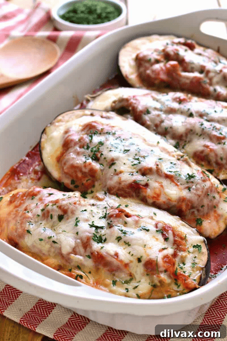 Making Sundays Simple: Week 62 Meal Plan 5 Baked Lasagna Stuffed Eggplant halves, topped with melted cheese and fresh herbs.